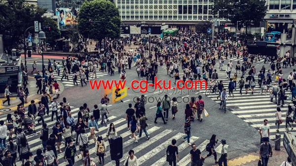 视频素材-高角度延时拍摄拥挤的街道汹涌的人群穿过街道交叉口的图片1