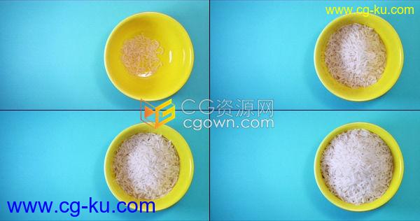 近景实拍米粒逐渐装满黄色大碗传统主食白饭烹饪4K视频素材下载的图片1